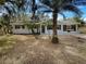 Front view of the house showcasing its curb appeal at 1361 Peters Dr, Leesburg, FL 34748