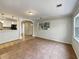 Bright living room with tile floors and an open layout at 1361 Peters Dr, Leesburg, FL 34748