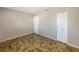 Spacious bedroom with tile flooring and double doors at 1490 Lake Opal Dr, Apopka, FL 32703