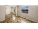 Bedroom with mirrored closet and tile floors at 1490 Lake Opal Dr, Apopka, FL 32703