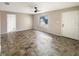Living room with tile floor and access to other rooms at 1490 Lake Opal Dr, Apopka, FL 32703