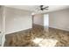 Large living area with tile floors and neutral walls at 1490 Lake Opal Dr, Apopka, FL 32703