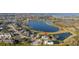 Aerial view showing home location near lake at 15107 Lake Claire Overlook Dr, Winter Garden, FL 34787