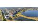Aerial view showcasing home's location near a lake at 15107 Lake Claire Overlook Dr, Winter Garden, FL 34787