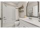 Clean bathroom with a shower/tub combo and modern vanity at 15107 Lake Claire Overlook Dr, Winter Garden, FL 34787