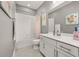 Clean bathroom with a tub, shower, and white vanity at 15107 Lake Claire Overlook Dr, Winter Garden, FL 34787