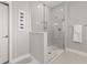Bathroom with a large walk-in shower at 15107 Lake Claire Overlook Dr, Winter Garden, FL 34787