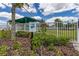 Landscaped community garden with a butterfly garden at 15107 Lake Claire Overlook Dr, Winter Garden, FL 34787