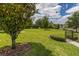 Dog park with grassy area and seating at 15107 Lake Claire Overlook Dr, Winter Garden, FL 34787