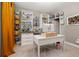 Bright home office features built-in shelving and a large desk at 15107 Lake Claire Overlook Dr, Winter Garden, FL 34787
