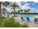 Resort-style pool with lounge chairs at 15107 Lake Claire Overlook Dr, Winter Garden, FL 34787