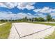 Enjoy recreational fun with this community sand volleyball court at 15107 Lake Claire Overlook Dr, Winter Garden, FL 34787