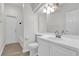 Bright bathroom with tub, toilet and a vanity at 1700 Bridlewalk Ct, Gotha, FL 34734
