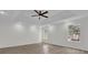 Large bedroom featuring two windows and a ceiling fan at 1700 Bridlewalk Ct, Gotha, FL 34734
