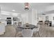 Open concept kitchen with an island and dining area at 1700 Bridlewalk Ct, Gotha, FL 34734