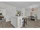 Open concept kitchen with island and breakfast bar at 1700 Bridlewalk Ct, Gotha, FL 34734