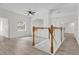 Spacious upper hallway with hardwood floors and natural light at 1700 Bridlewalk Ct, Gotha, FL 34734