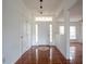 Bright and airy entryway with tile flooring and access to other rooms at 1717 Minnow Ct, Poinciana, FL 34759