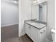 Modern bathroom with granite countertop and white cabinets at 2514 Park Ridge St, Apopka, FL 32712