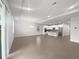 Open concept living room and kitchen with tile floors at 2514 Park Ridge St, Apopka, FL 32712