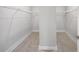 Spacious walk-in closet with wire shelving and tile flooring at 2514 Park Ridge St, Apopka, FL 32712