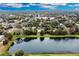 Aerial view showing home's location near a lake at 2808 Touraine Ave, Orlando, FL 32812