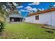 Backyard view showing a shed and additional green space at 2808 Touraine Ave, Orlando, FL 32812