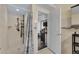 Clean bathroom with shower stall, tiled walls, and good storage at 2808 Touraine Ave, Orlando, FL 32812
