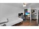 Cozy bedroom with a comfortable bed and home office at 2808 Touraine Ave, Orlando, FL 32812