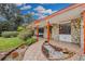 Mid-century home with stone exterior and a walkway at 2808 Touraine Ave, Orlando, FL 32812