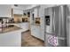Modern kitchen with granite countertops and stainless steel appliances at 2808 Touraine Ave, Orlando, FL 32812