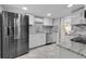 Modern kitchen with stainless steel appliances and granite counters at 2808 Touraine Ave, Orlando, FL 32812