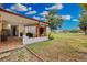 Covered patio with tiled floor and outdoor seating at 2808 Touraine Ave, Orlando, FL 32812