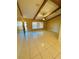 Inviting living room with vaulted ceilings, exposed wood beams, and bright, natural light at 3303 Jon Jon Dr, Orlando, FL 32822