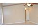 Spacious living room with tile floors and ceiling fan at 3303 Jon Jon Dr, Orlando, FL 32822