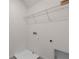 Functional laundry room with washer/dryer hookups and wire shelving at 33425 Country House Dr, Sorrento, FL 32776