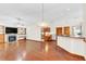 Spacious living room with hardwood floors and fireplace at 340 Plantation Club Dr, Debary, FL 32713