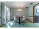 Bright dining area with a round table and chandelier at 400 Magnolia Oak Dr, Longwood, FL 32779