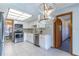 Modern kitchen with white cabinets and stainless steel appliances at 400 Magnolia Oak Dr, Longwood, FL 32779
