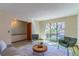 Bright living room with large windows and comfy seating at 400 Magnolia Oak Dr, Longwood, FL 32779