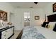 Main bedroom with king-size bed and en-suite bathroom at 421 High Tide Ln, Daytona Beach, FL 32124