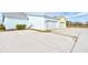 Two-car garage with two-toned exterior and ample parking at 421 High Tide Ln, Daytona Beach, FL 32124