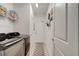 Clean laundry room with washer, dryer, and extra storage at 421 High Tide Ln, Daytona Beach, FL 32124