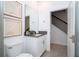 Small bathroom with toilet and vanity at 4447 Scene Ln, Kissimmee, FL 34746