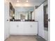 Bathroom with double vanity and bathtub at 4447 Scene Ln, Kissimmee, FL 34746
