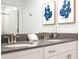 Modern bathroom with double vanity and gray countertop at 4447 Scene Ln, Kissimmee, FL 34746