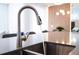 Sleek kitchen sink and faucet with a modern design at 4447 Scene Ln, Kissimmee, FL 34746