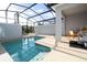 Private screened pool and outdoor kitchen at 4447 Scene Ln, Kissimmee, FL 34746