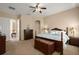 Well-lit bedroom with neutral tones, comfortable carpeting, and a spacious layout at 4943 Cains Wren Trl, Sanford, FL 32771