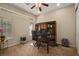 Bright office space with natural light, built-in shelving, and a comfortable workspace at 4943 Cains Wren Trl, Sanford, FL 32771